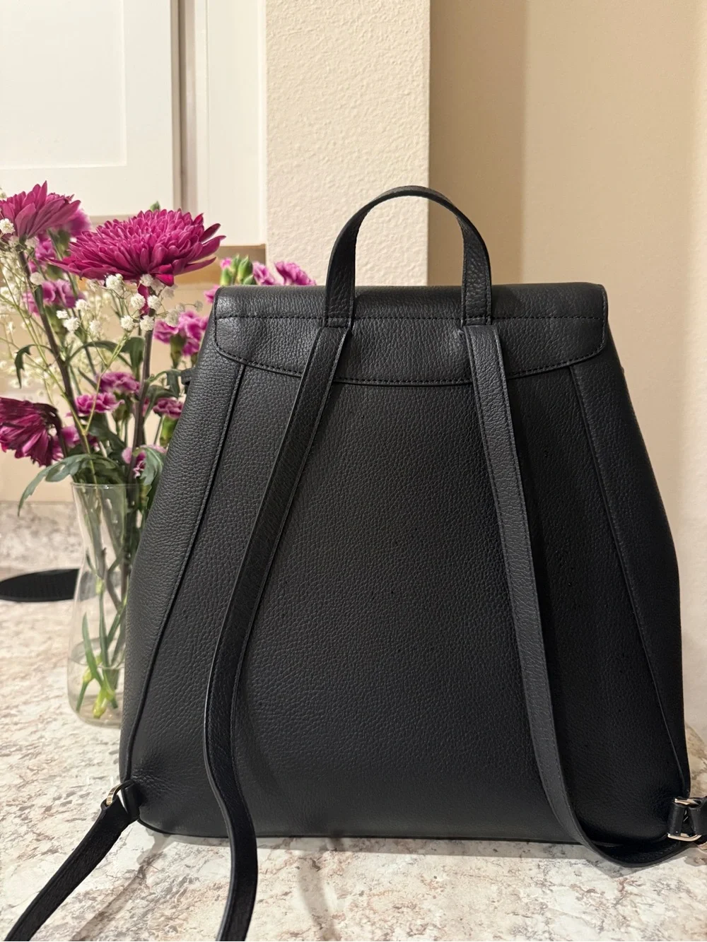 kate spade Black Pebbled Leather Backpack with Gold Logo
